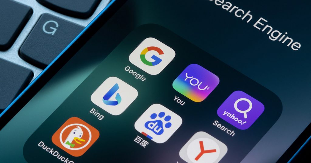 Assorted search engine apps including Google, You.com and Bing are seen on an iPhone. Microsoft plans to use ChatGPT in Bing, and You.com has launched an AI chatbot.